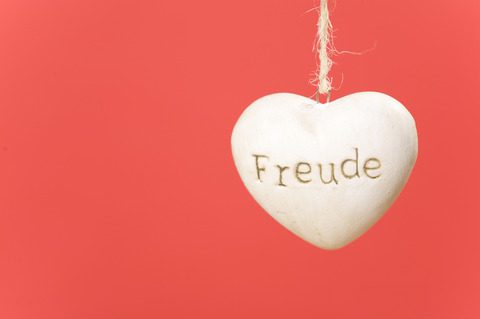 German word for joy on a heart-shaped trinket, Germany