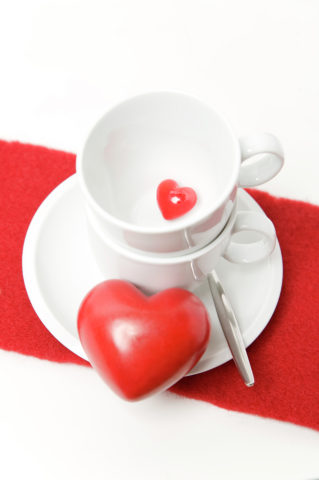 Small and large heart with coffee cups