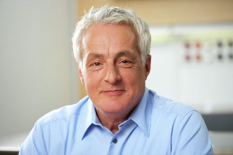 Gray-haired man, close-up