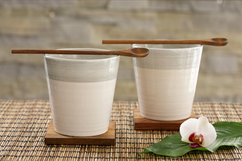 Wooden spoons on beakers