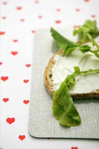 Close-up of a bread with cream cheese