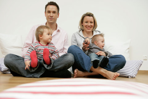 Portrait of a family with two baby boys