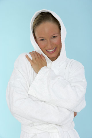 Young woman wearing a bathrobe