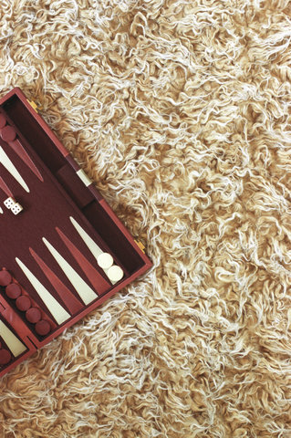 Backgammon Board laying on a Carpet (cropped)