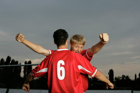 Soccer players jubilating