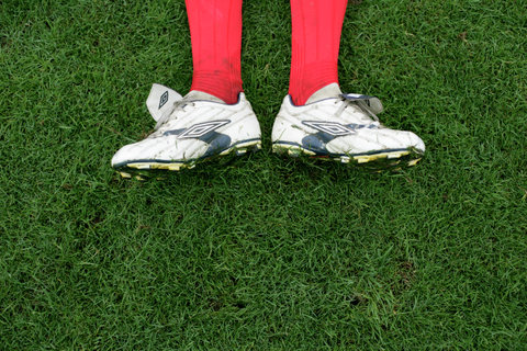 Football shoes on grass
