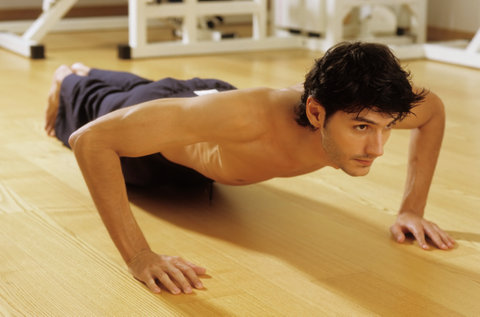 Darkhaired Man doing Press-Ups - Sportiness - Gymnastics