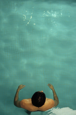 Darkhaired Man in a Swimming-Pool - Sports - Leisure Time