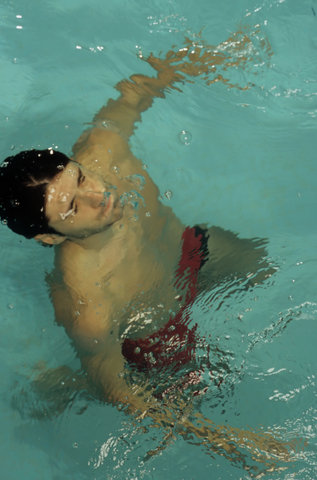 Man piping down under Water - Swimming-Pool - Swimming - Sports - Leisure Time